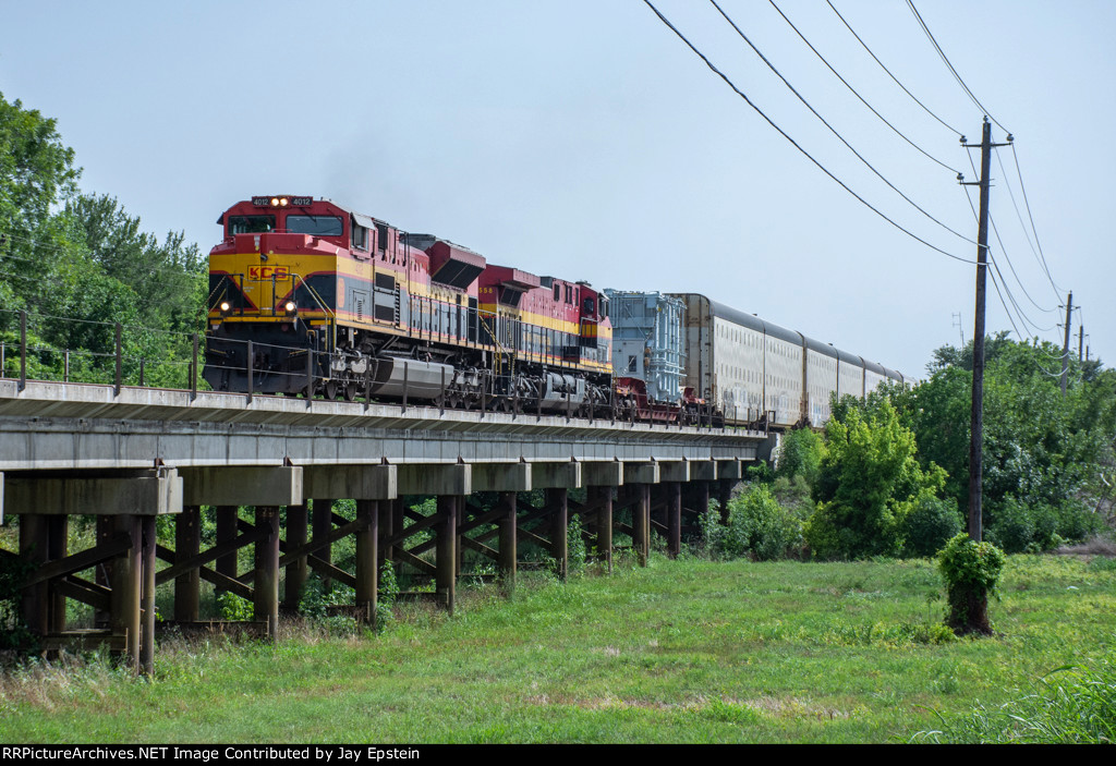 KCS 4012 crosses a low bridge north of Ganado, Texas